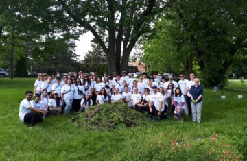 Unilever volunteers at King and John on June 8, 2022, with their harvest of weeds.